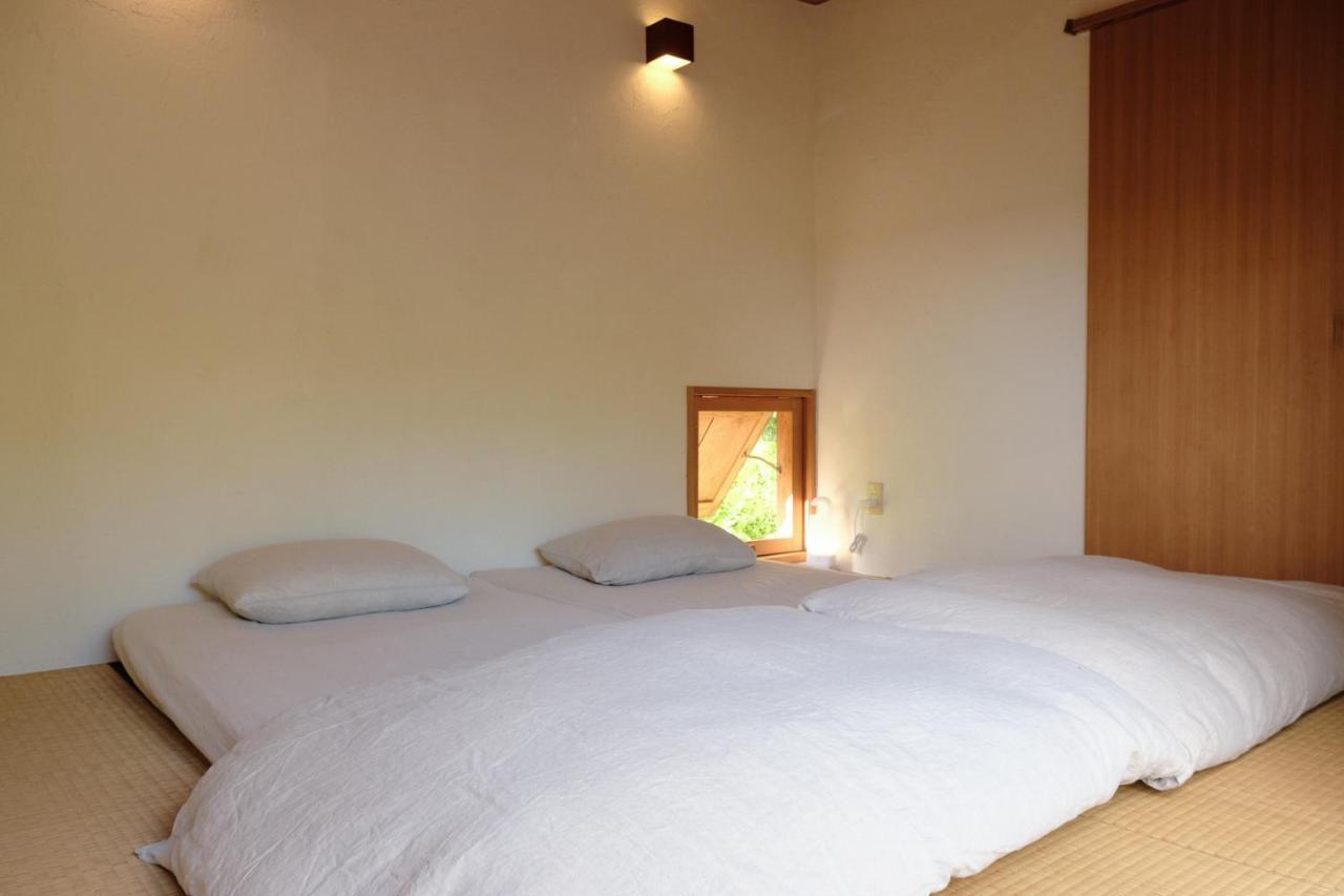 姉と弟の家 Hotel Nanjo Bagian luar foto